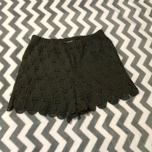 Olive green lace shorts.